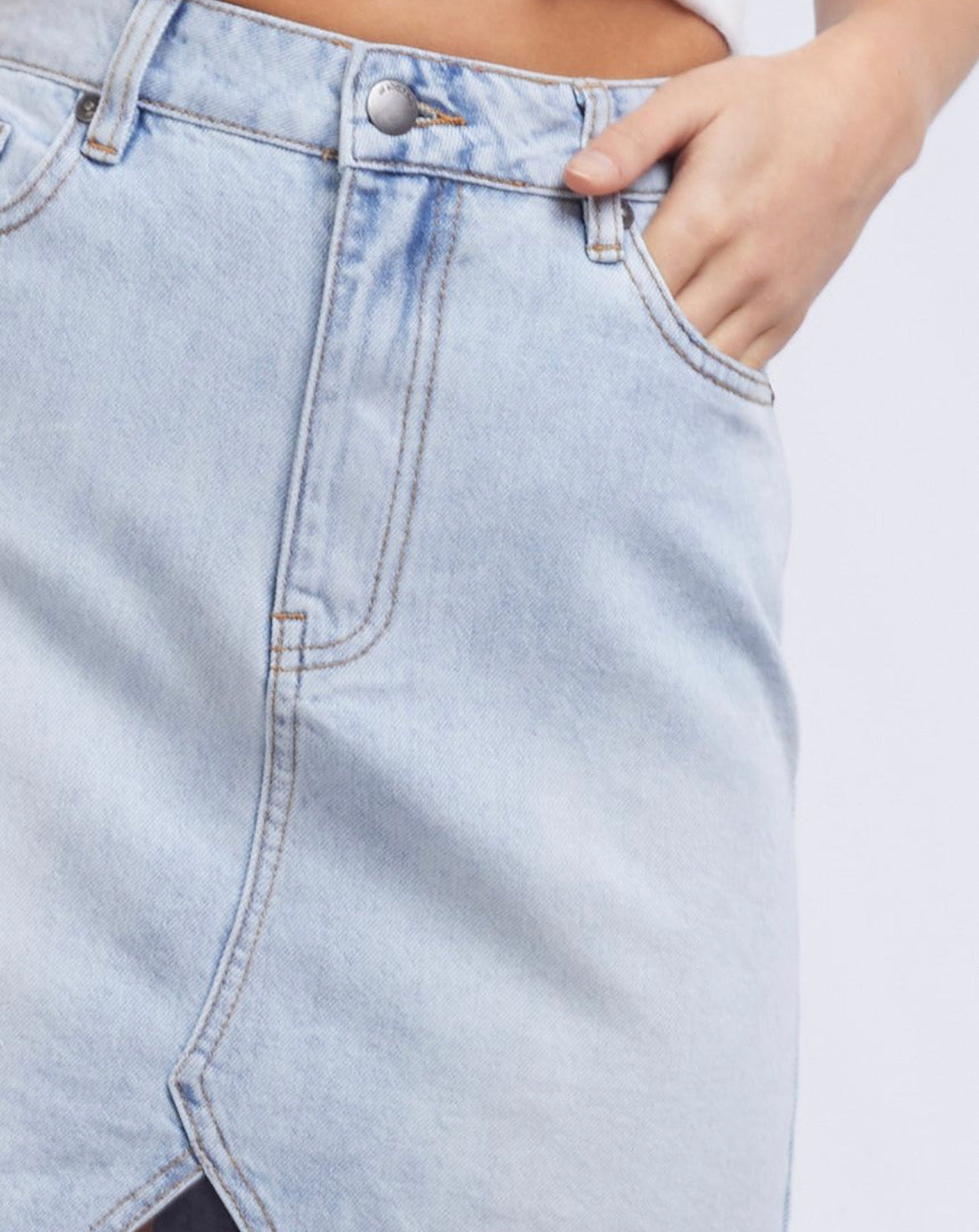 All About Eve Blair split skirt is rigid cotton denim, has a high waist, split front hem and mini in length