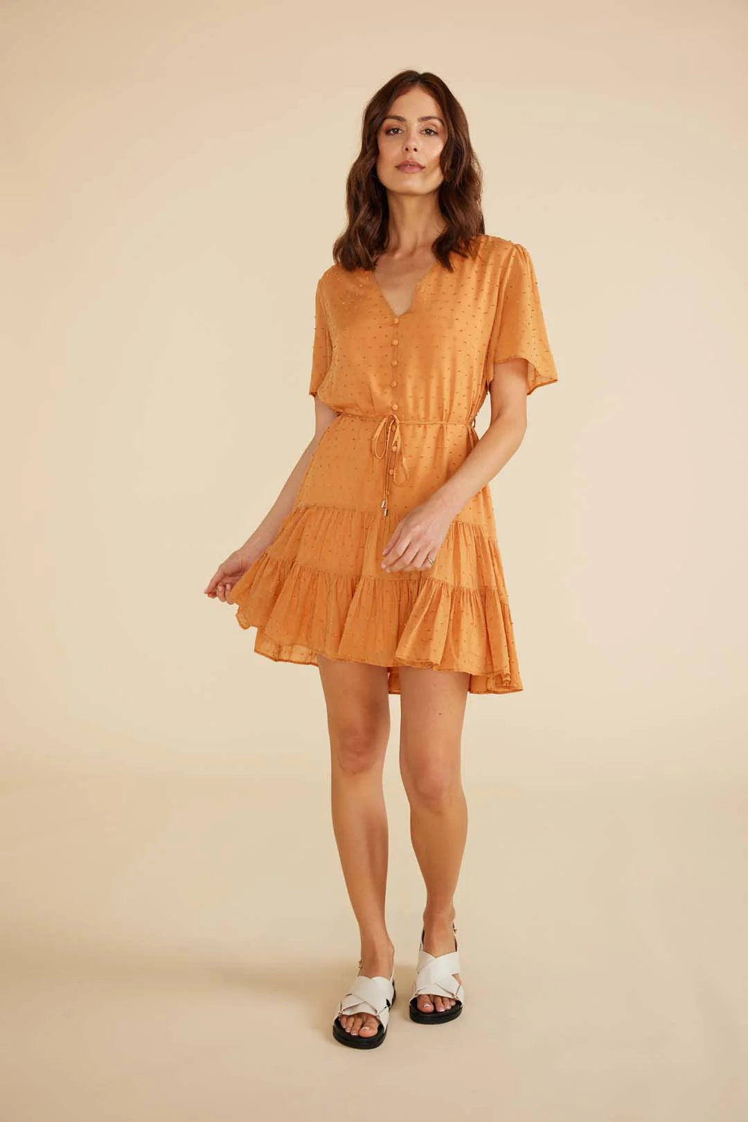 Dahlia mini dress from Minkpink withV neckline, flowy sleeves
Tie strap at waist New Zealand