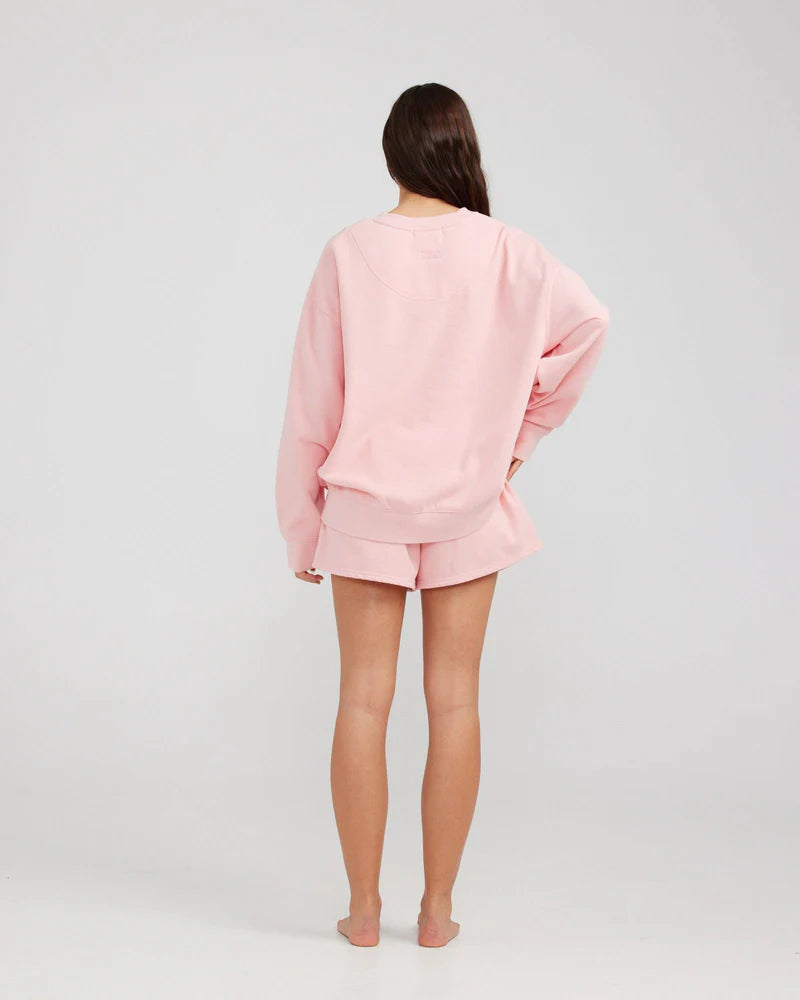 Womens pink sweatshirt from Charlie Holiday