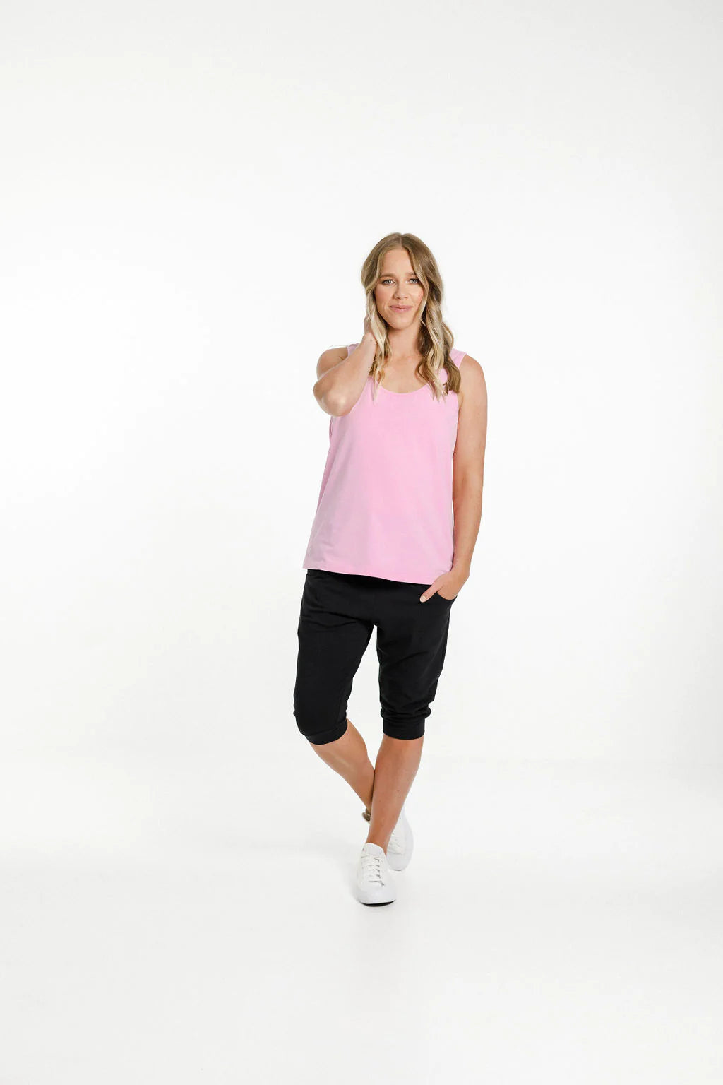 Pink womens singlet from Home-Lee, with a scooped neckline front and back and straight cut hem
