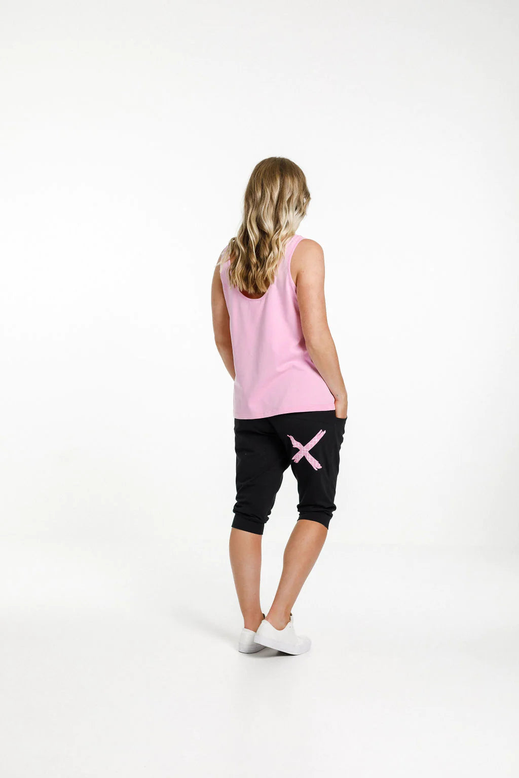 Pink womens singlet from Home-Lee, with a scooped neckline front and back and straight cut hem