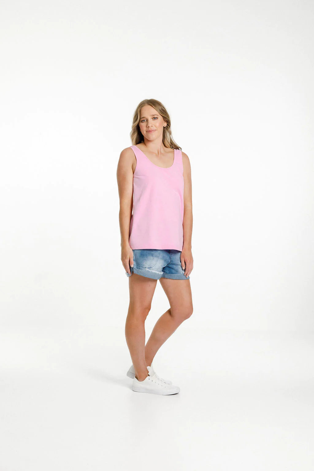 Pink womens singlet from Home-Lee, with a scooped neckline front and back and straight cut hem