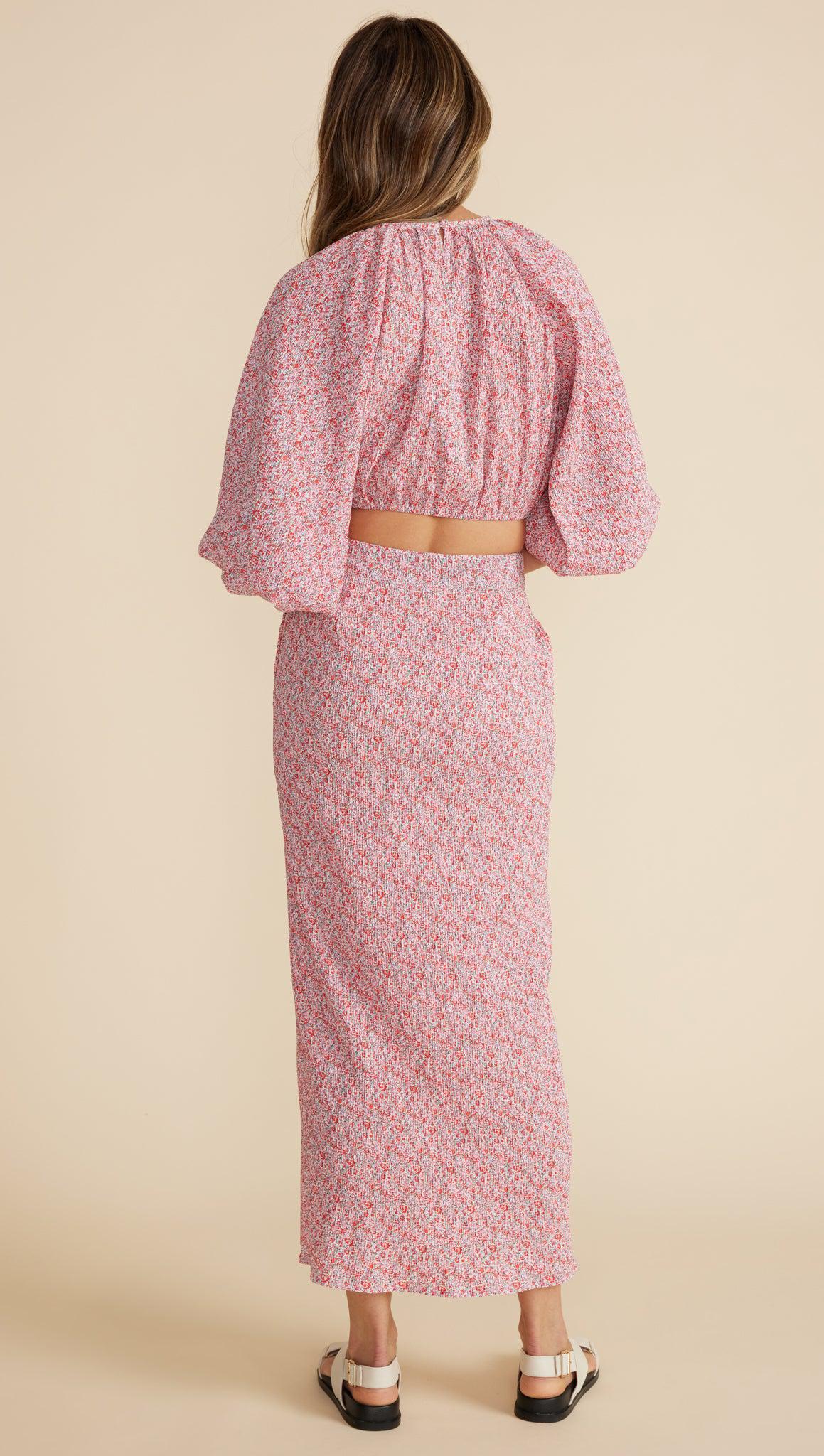 The Raya Slip Skirt is a classic slip skirt with side seam pockets