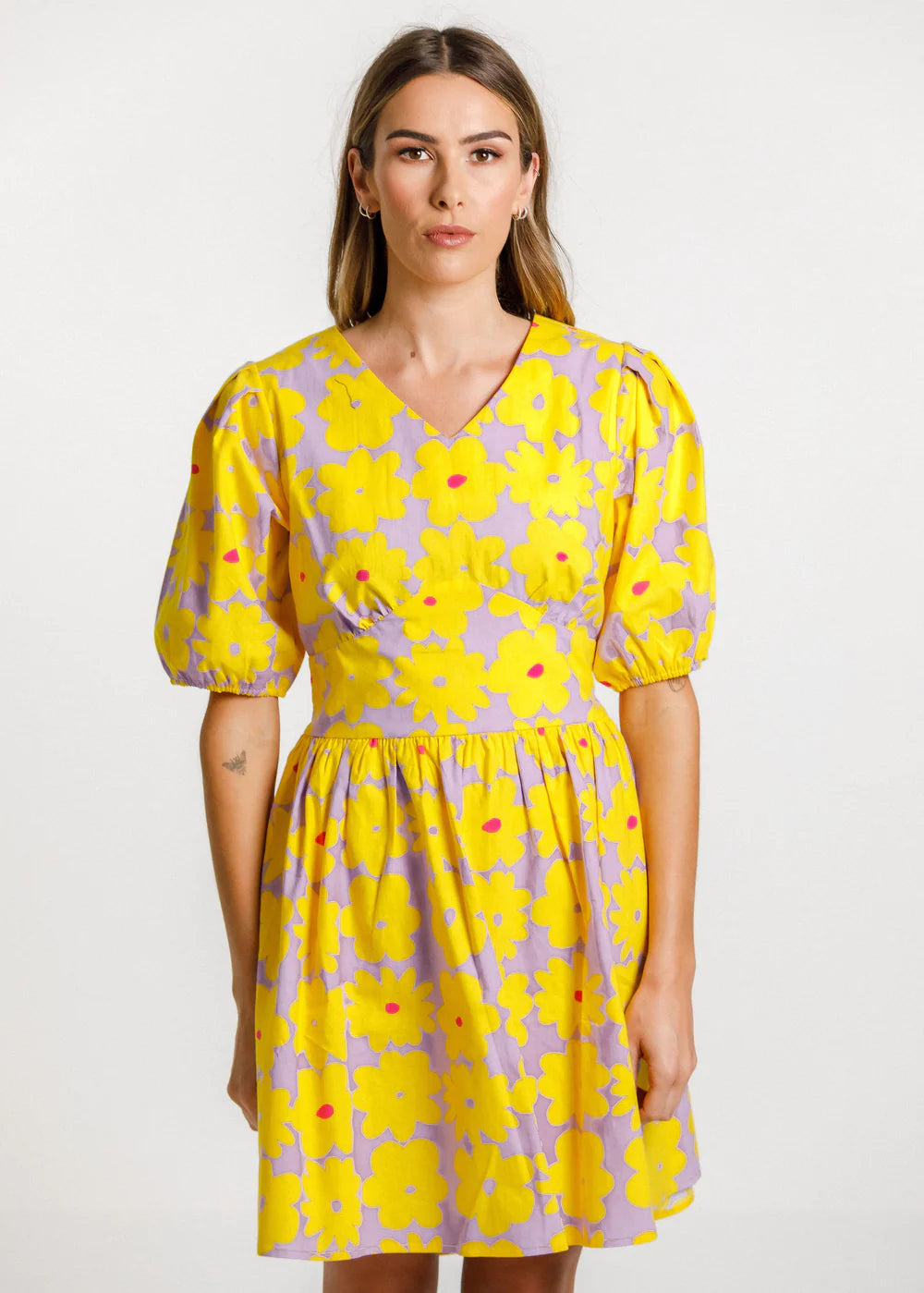 Thing Thing women's dress. Tropicana print with puffed shoulder detail, and cut out with tie feature at the back