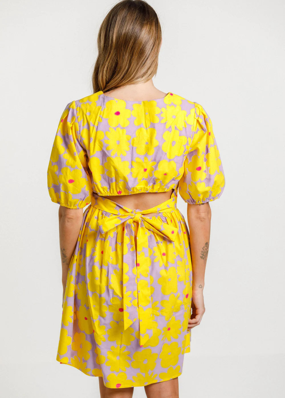 Thing Thing women's dress. Tropicana print with puffed shoulder detail, and cut out with tie feature at the back