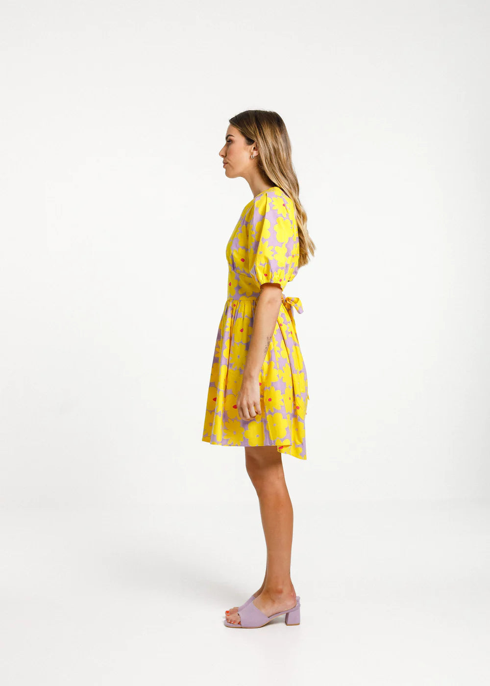 Thing Thing women's dress. Flower print with puffed shoulders, and cut out with tie feature at the back