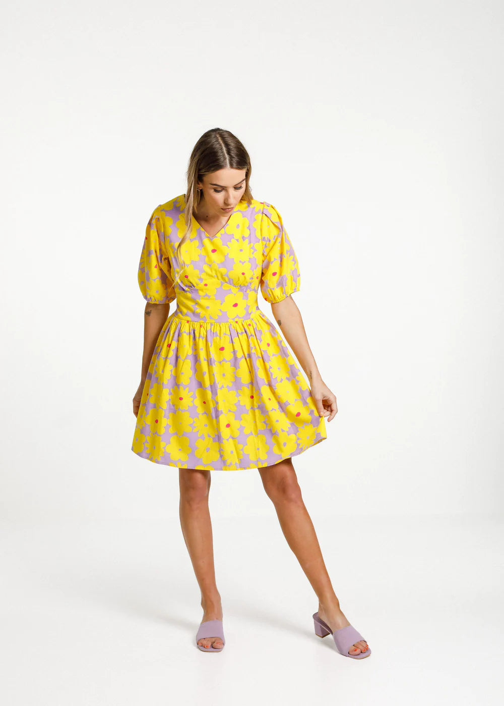 Thing Thing women's dress. Tropicana print with puffed shoulder detail, and cut out with tie feature at the back