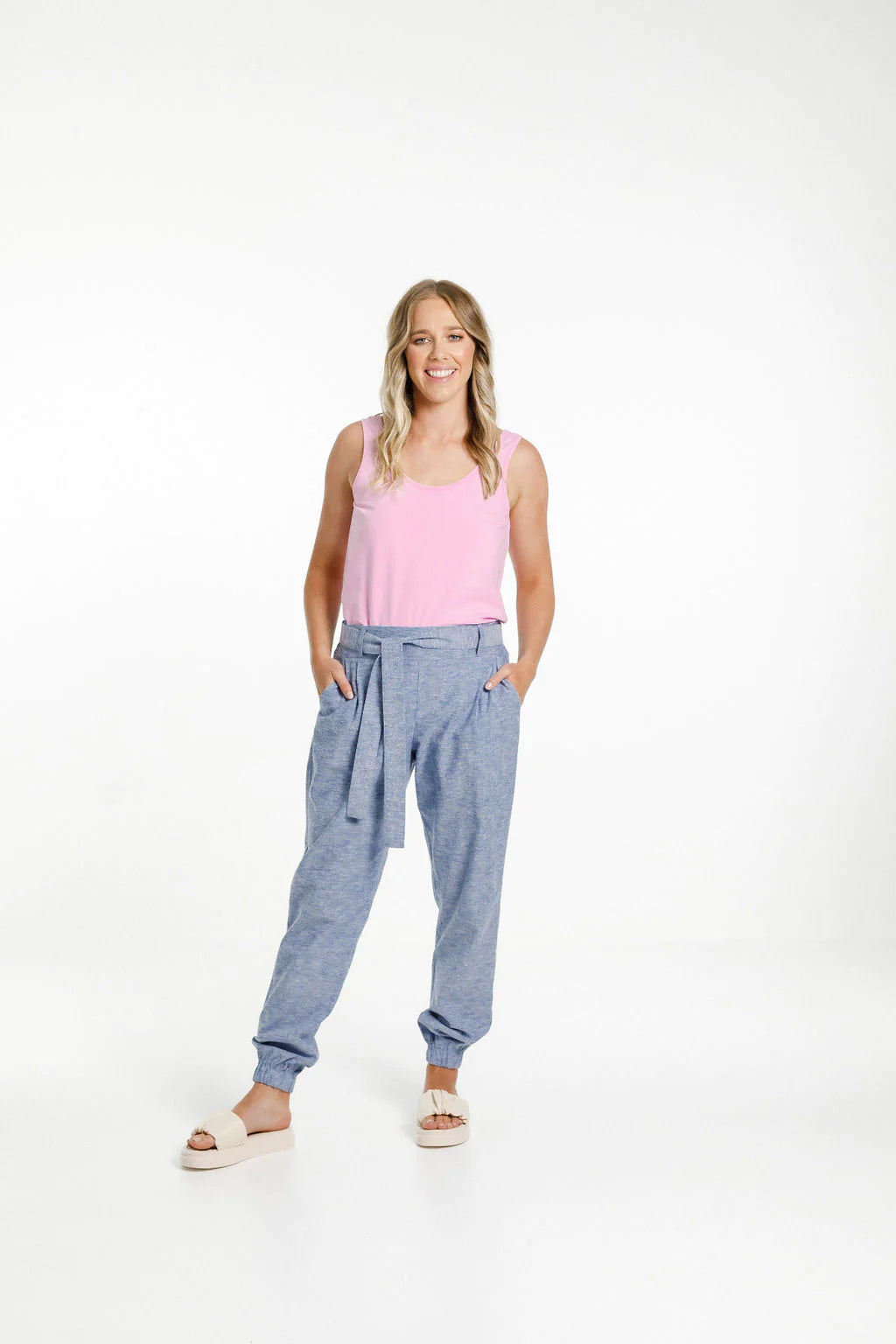 Pink womens singlet from Home-Lee, with a scooped neckline front and back and straight cut hem