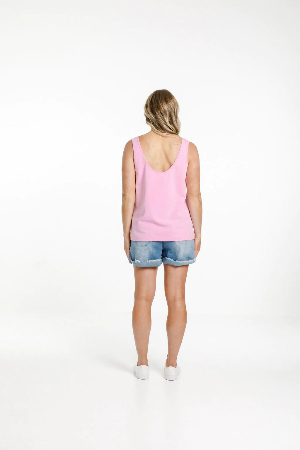 Pink womens singlet from Home-Lee, with a scooped neckline front and back and straight cut hem