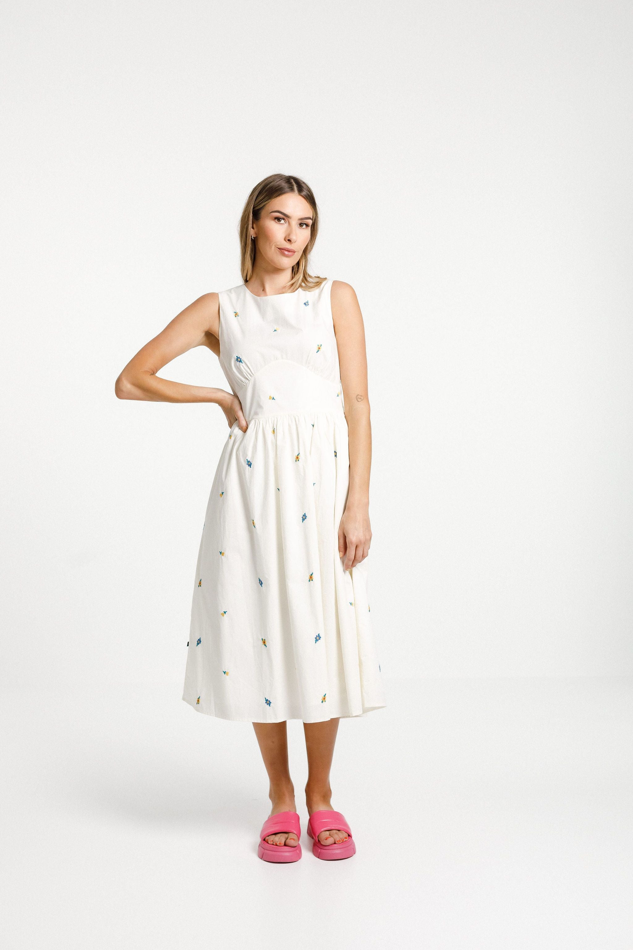 flower details on white dress, cut out back New Zealand