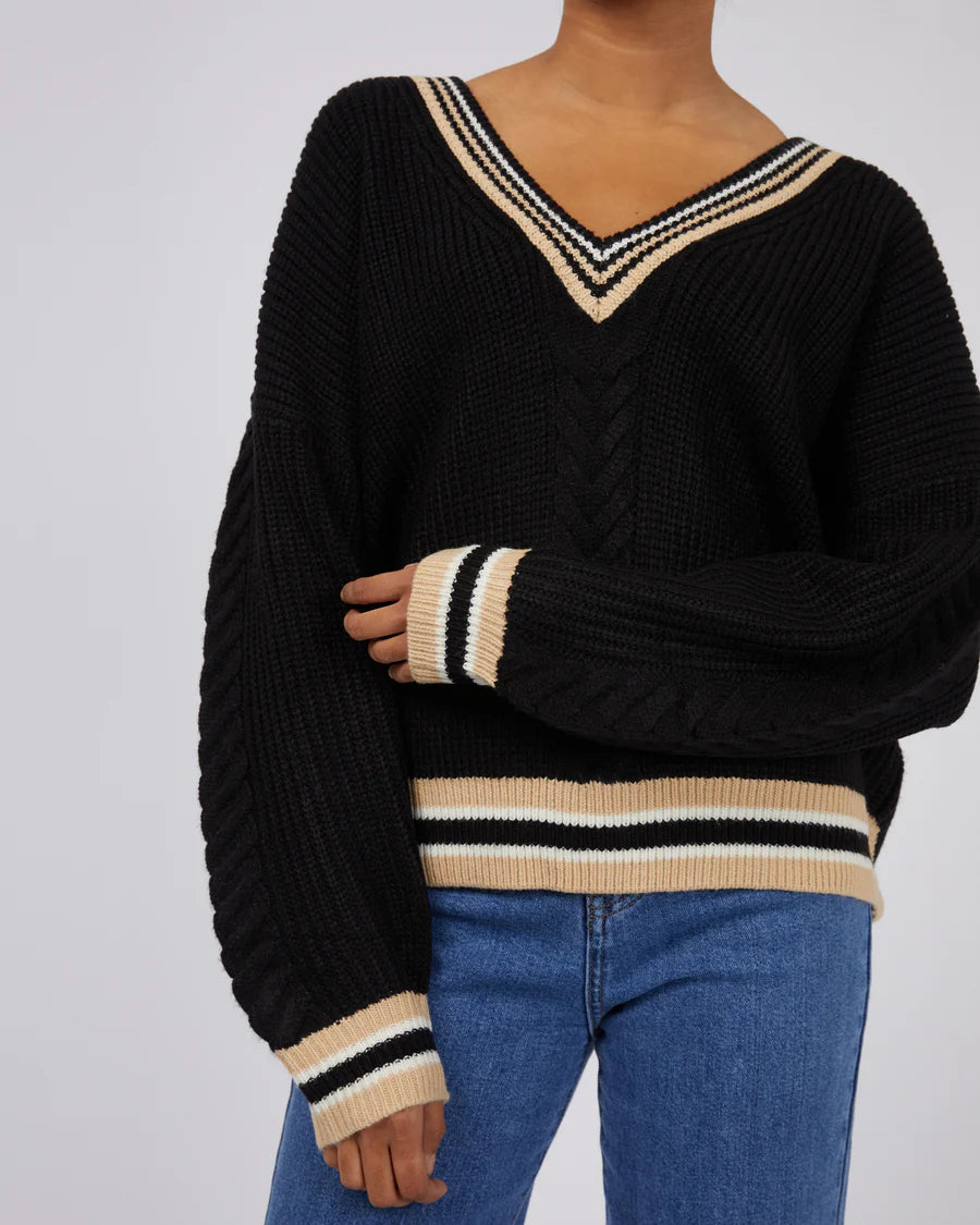 Black cable knit with a v neck and contrast stripe