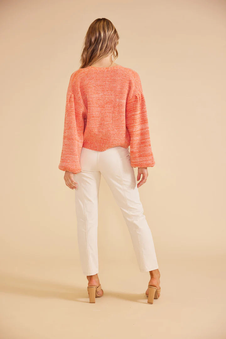 Mille cardigan from MinkPink tomato red hue, blouson sleeves, and ribbed cuffs.