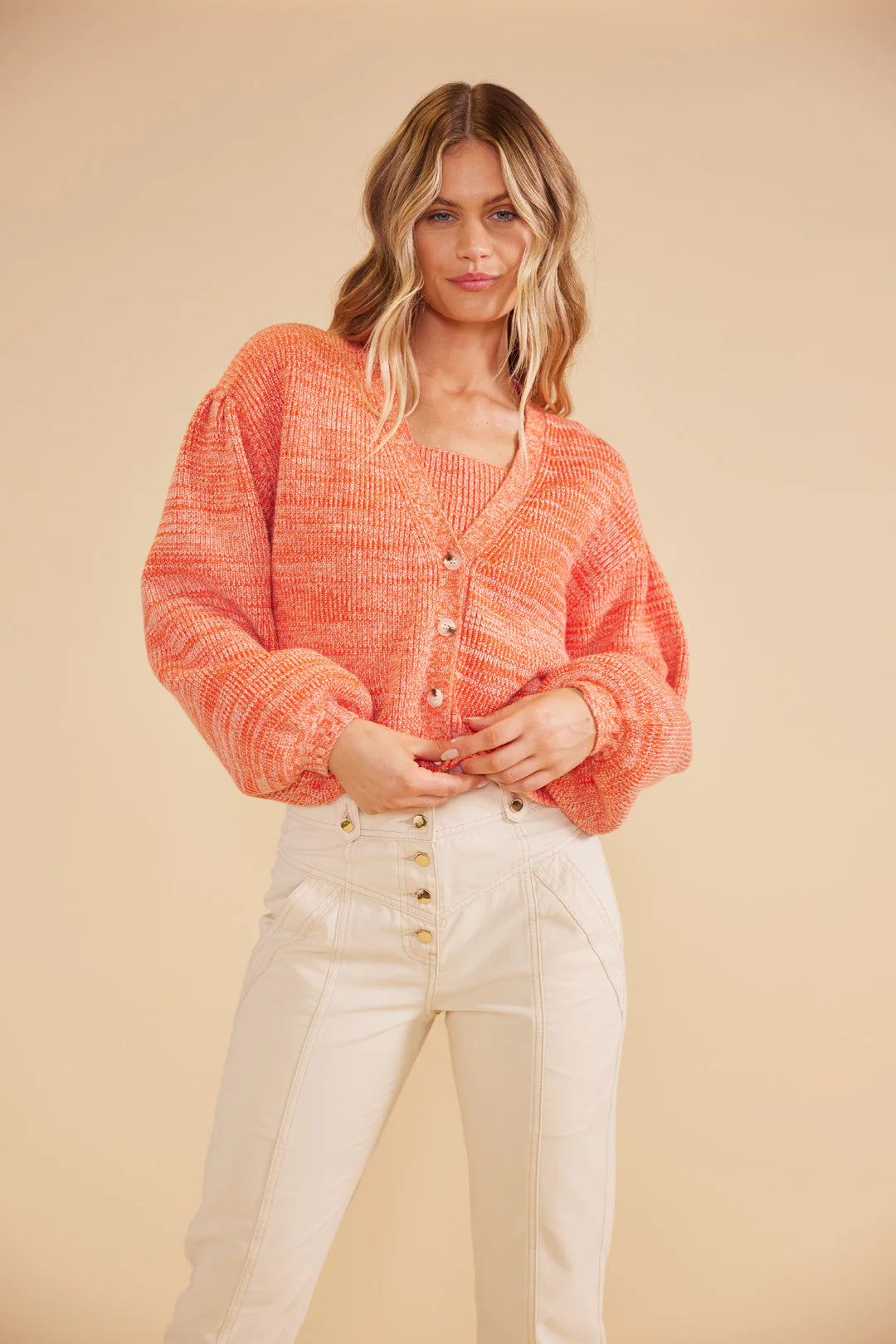 Mille cardigan from MinkPink tomato red hue, blouson sleeves, and ribbed cuffs.