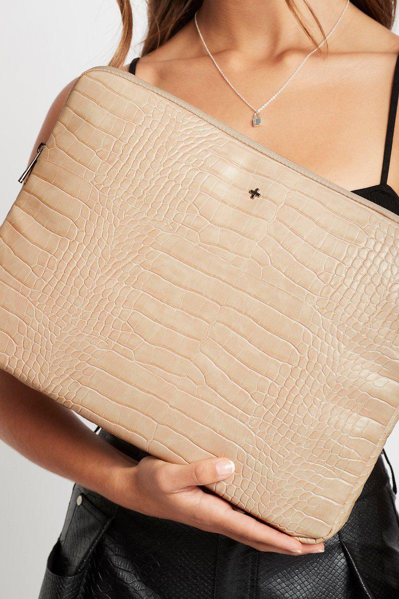 nude croc embossed vegan leather as well and extra zip compartment for any extra storage