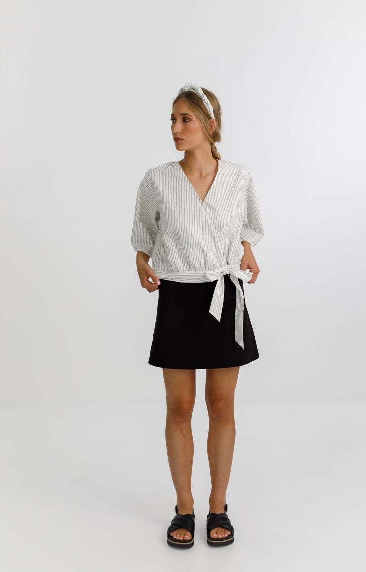 Izzy top with a wrap front, delicate tie, 3/4 sleeves and a deep v neckline
