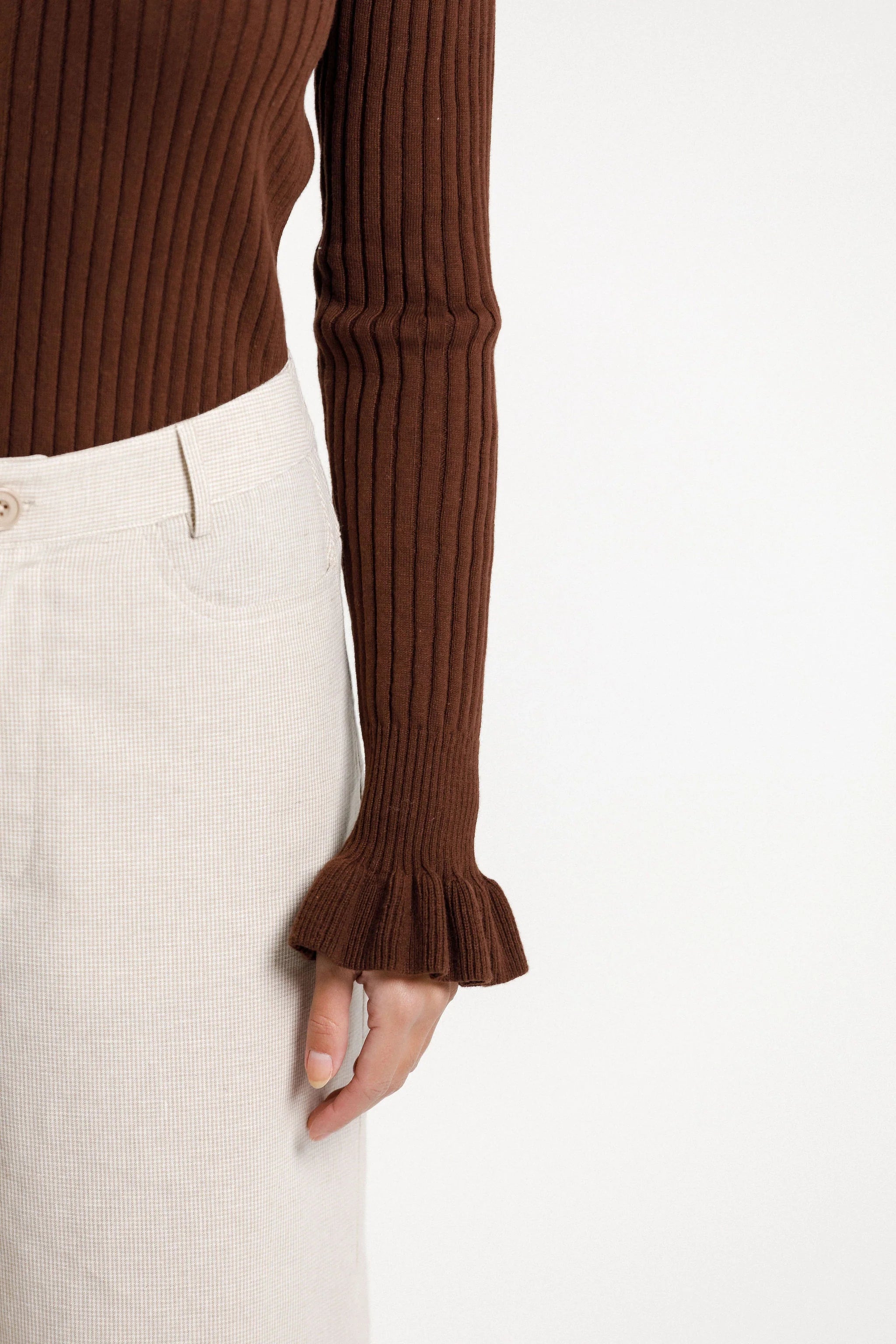 Ruffle long sleeve ribbed turtle neck, ruffle neckline and frilled sleeve