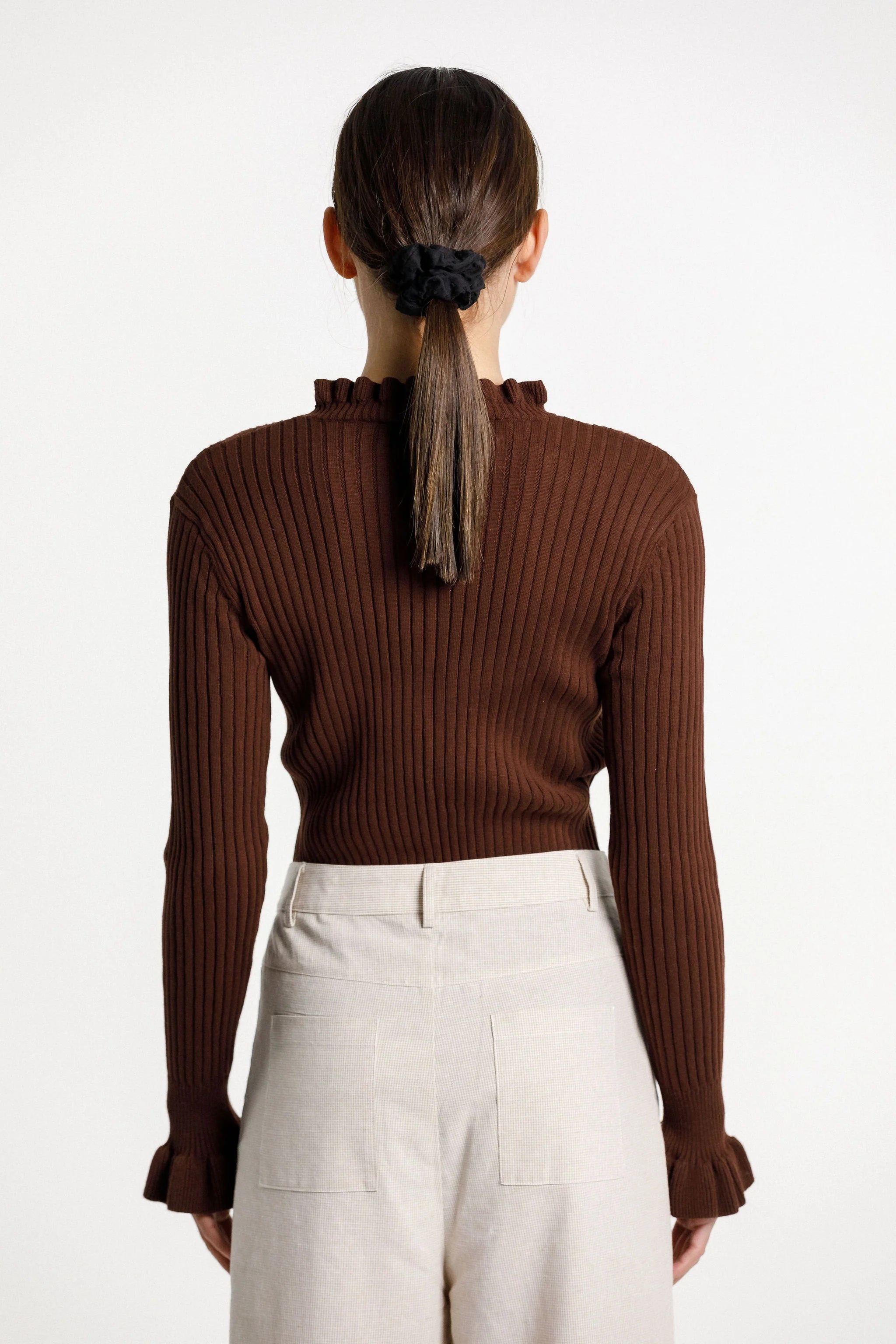 Ruffle long sleeve ribbed turtle neck, ruffle neckline and frilled sleeve