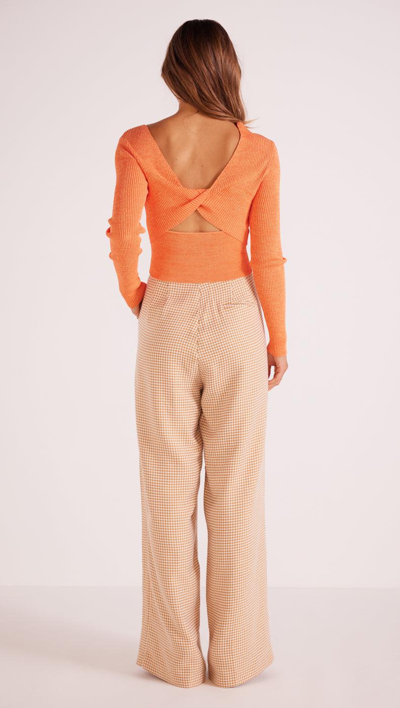 Fresco Twist Back Top tight fitting silhouette , twist cut-out detail at the backl