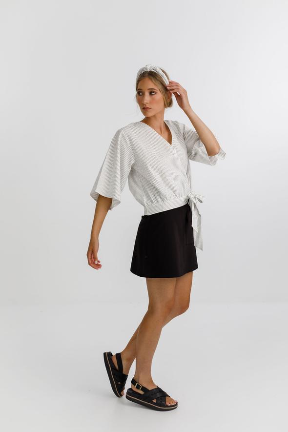 Izzy top with a wrap front, delicate tie, 3/4 sleeves and a deep v neckline