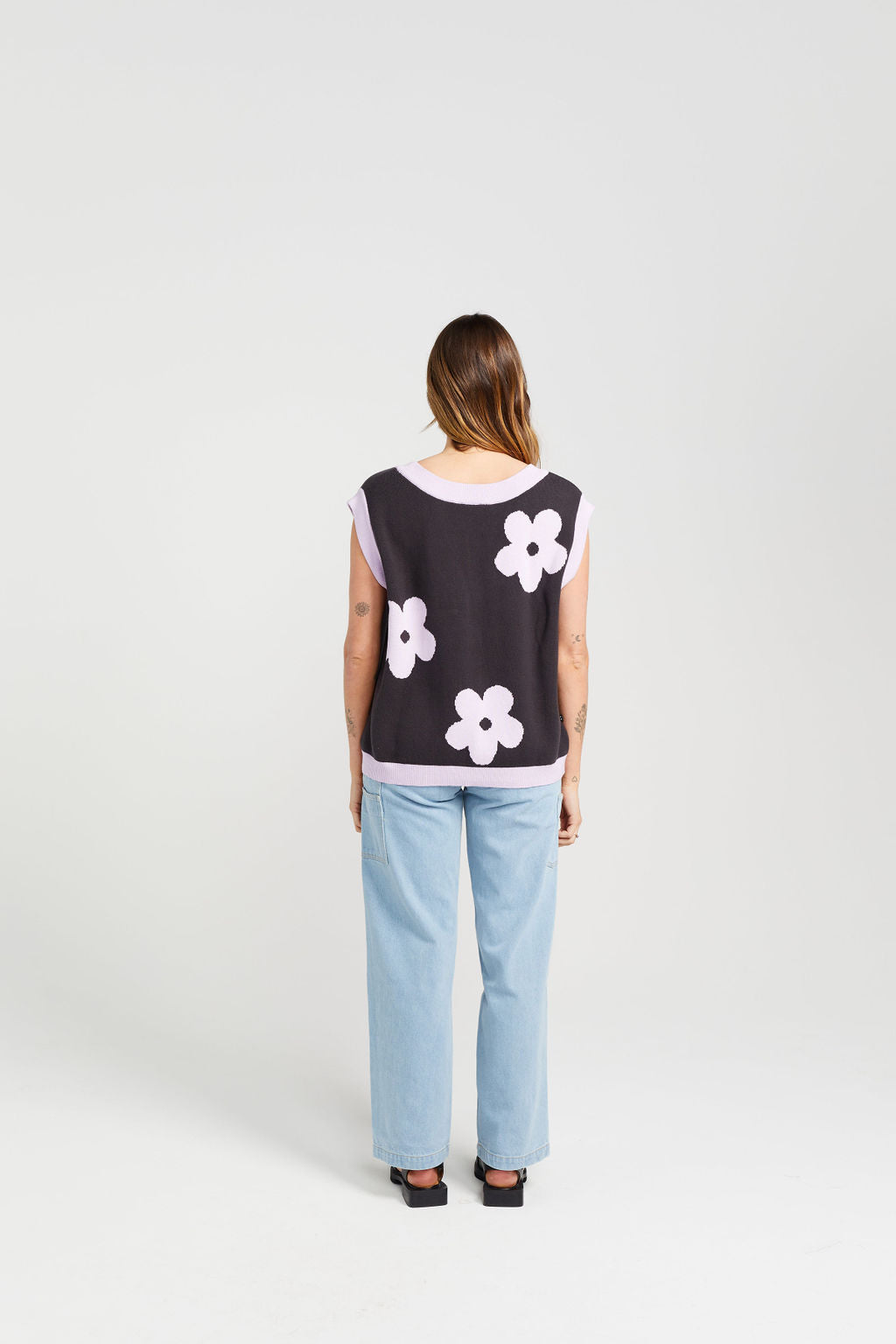 Cotton vest for summer and spring. A navy blue vest with lilac flower print 