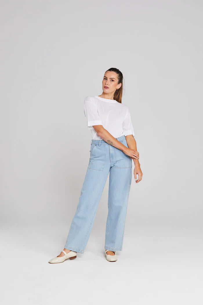 Helpful Jean is cut in a non-stretch denim and features four very 'helpful' pockets, carpenters loop, rivets, zip fly with tack closure, and belt loops.