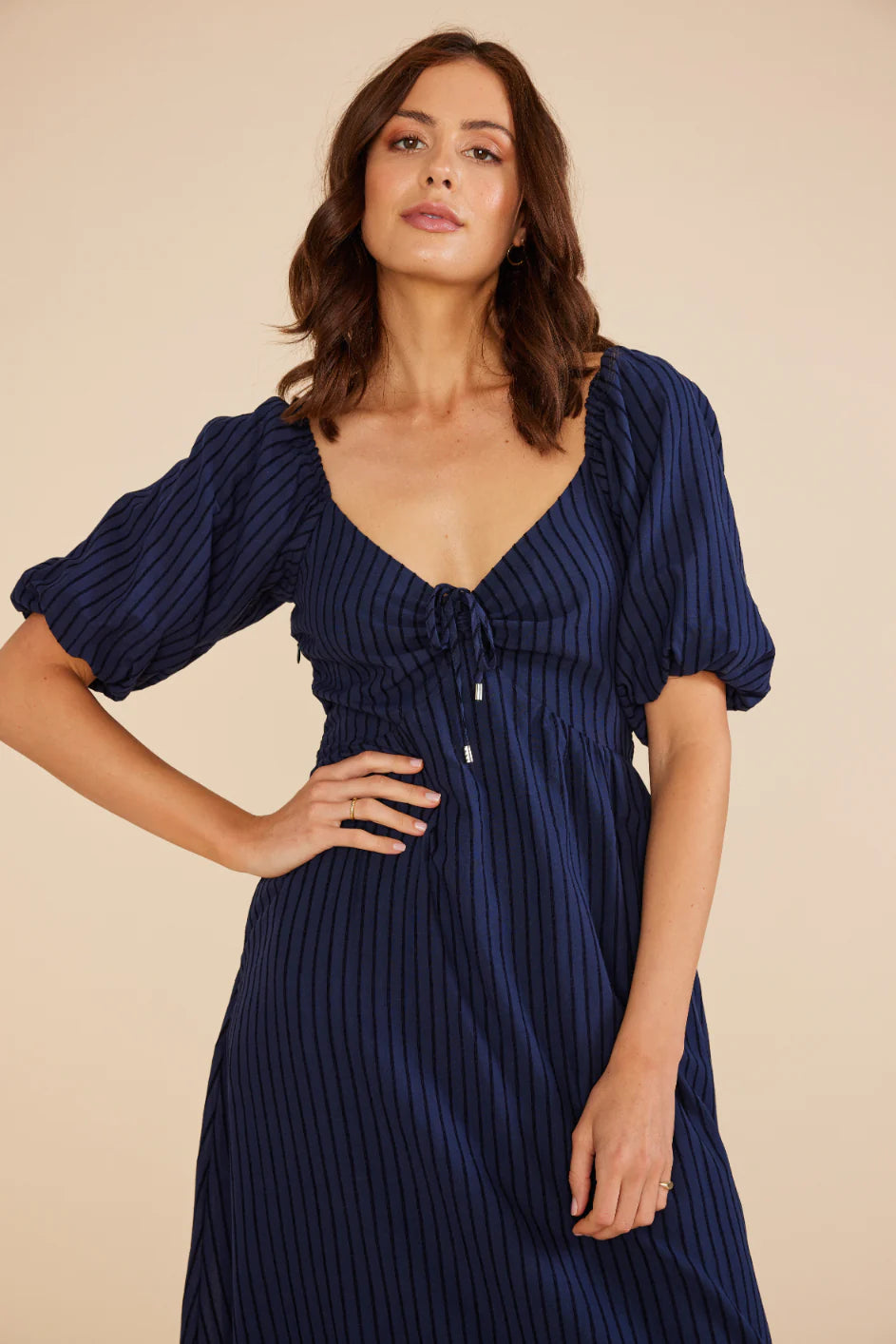 Minkpink Arielle midi dress with Sweetheart neckline with gathered tie at bust, puff sleeves and Midi length