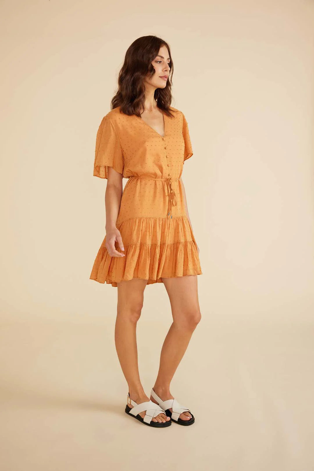 Dahlia mini dress from Minkpink withV neckline, flowy sleeves
Tie strap at waist New Zealand