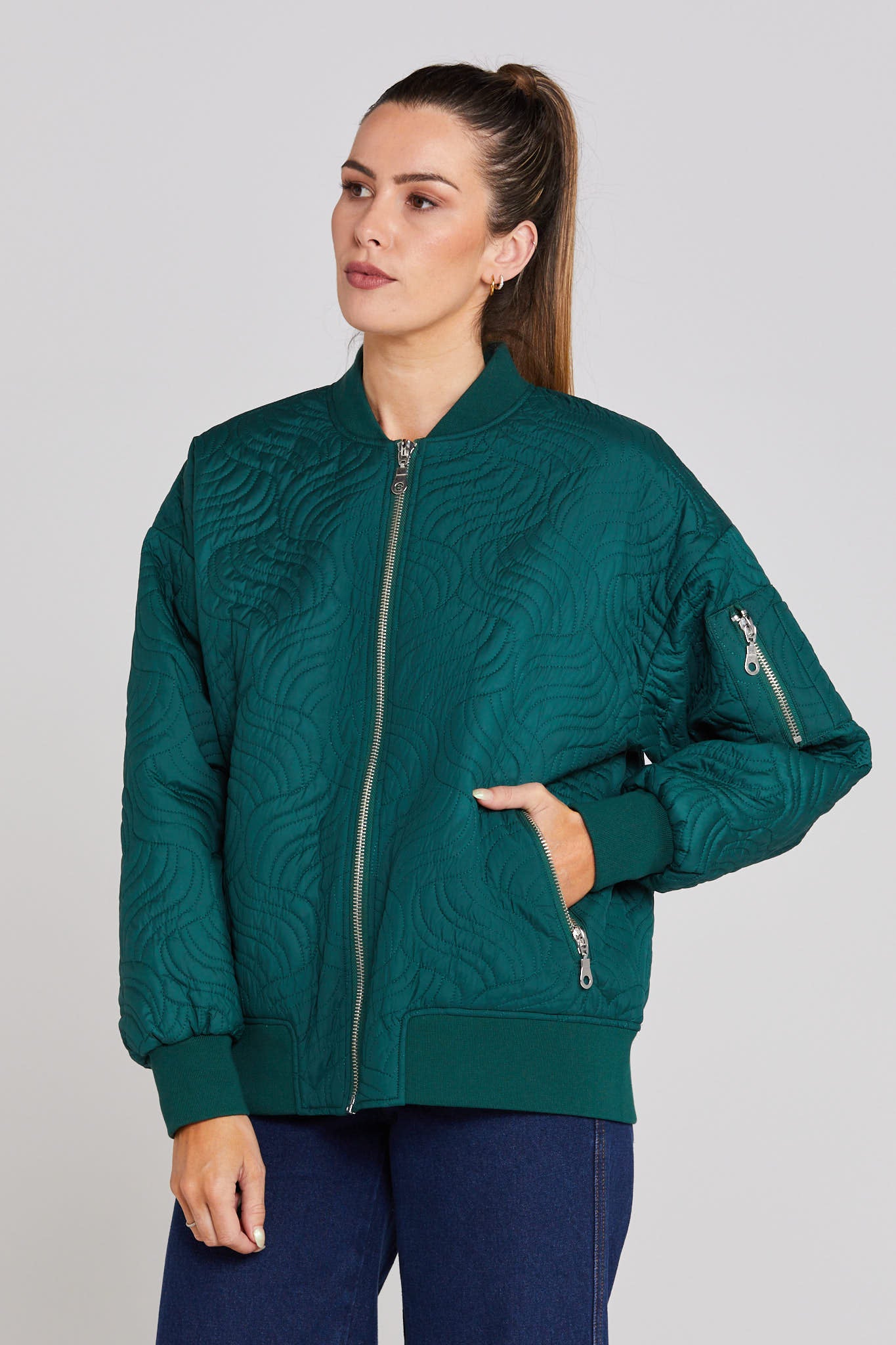 Hem cuffs. Green with zips.quilted