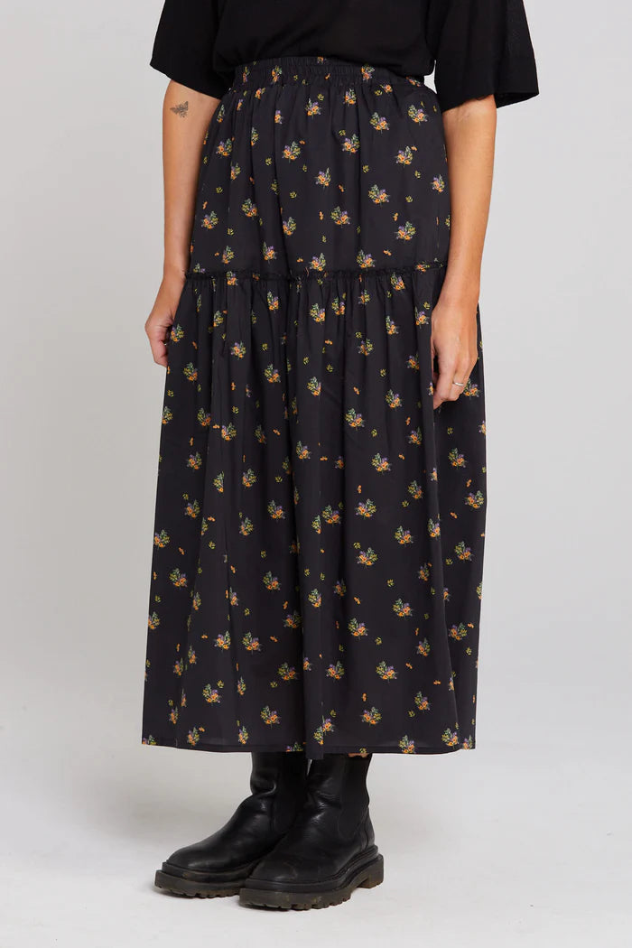 Floral cotton skirt with side pockets and midi length