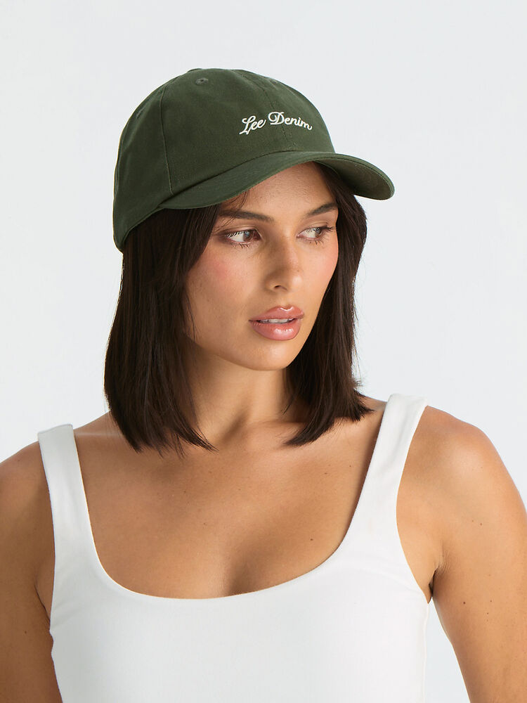 Green cap with 'Lee Denim' logo on a white background