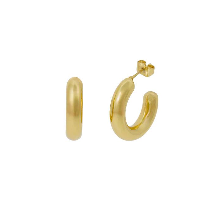 A pair of gold-colored chunky hoop earrings 
