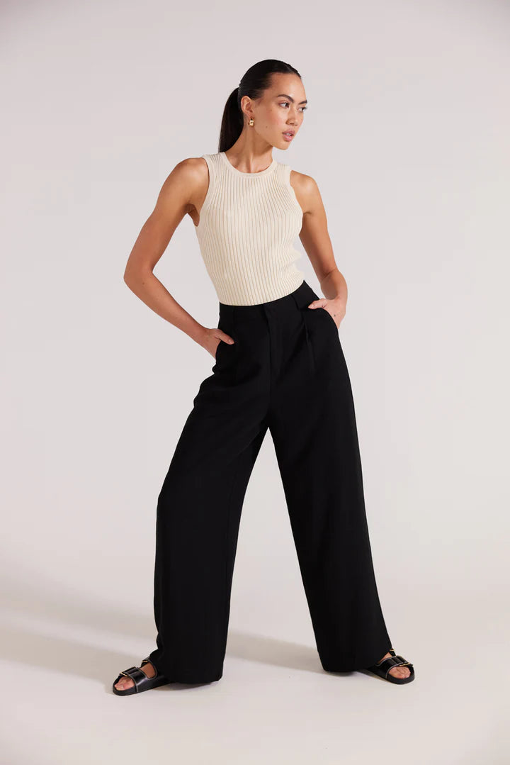 Black wide leg trousers, a high rise waistline, pockets and relaxed fit. staple the label Nw Zealand