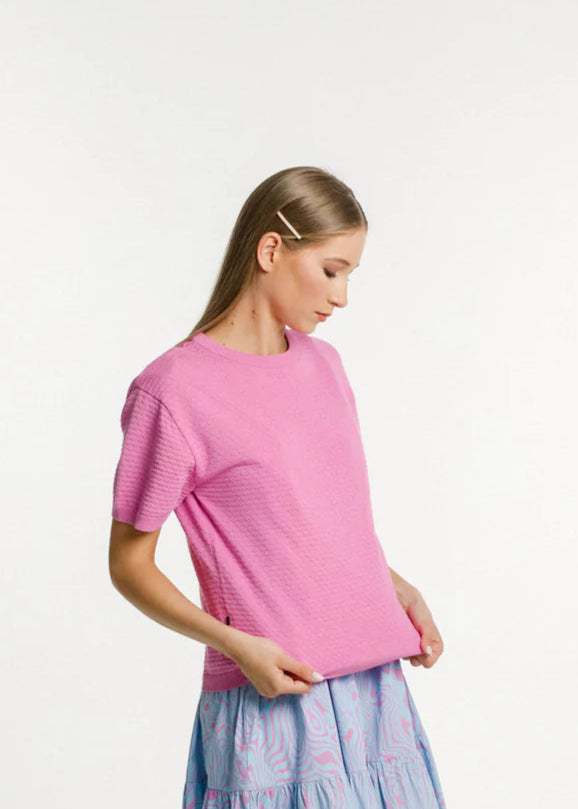 Cotton  pink knitted tee with crew ribbed neckline and boxy fit.