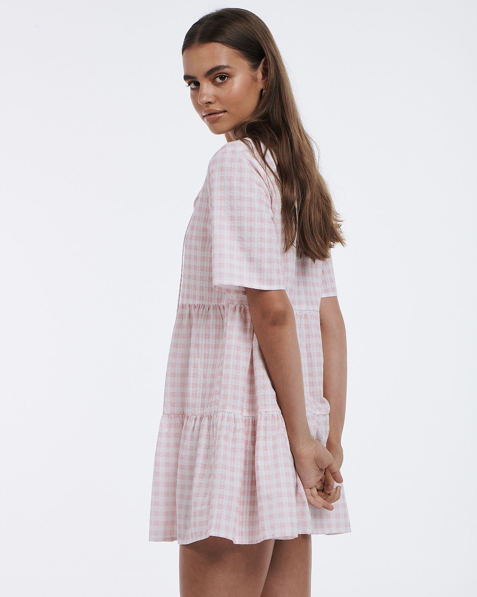 Charlie Holiday loose-fit mini dress is super cute in pink gingham