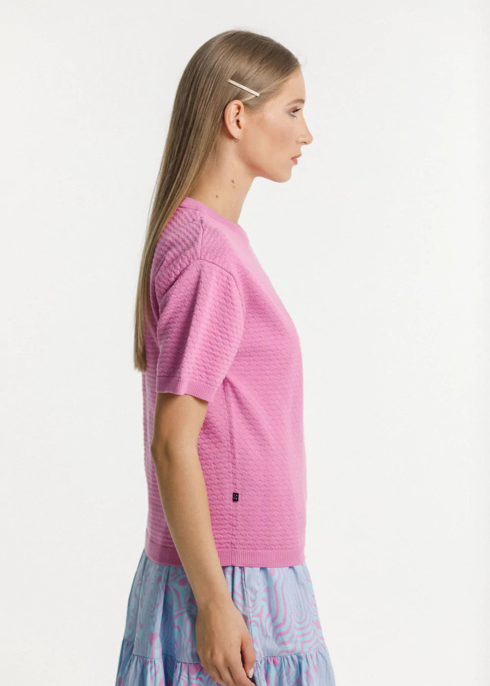 Cotton  pink knitted tee with crew ribbed neckline and boxy fit.