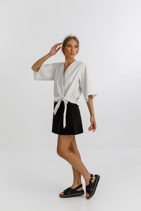 Izzy top with a wrap front, delicate tie, 3/4 sleeves and a deep v neckline 